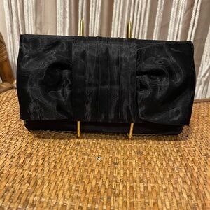 black satin evening clutch w/ pleated bow design & thin braided shoulder strap